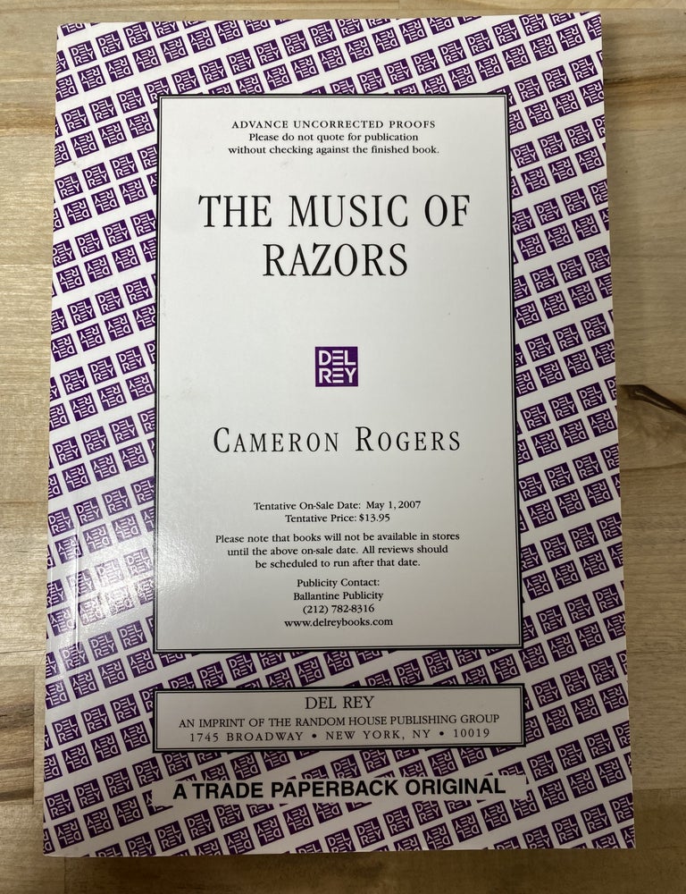 Item #864 The Music of Razors. Cameron Rogers.